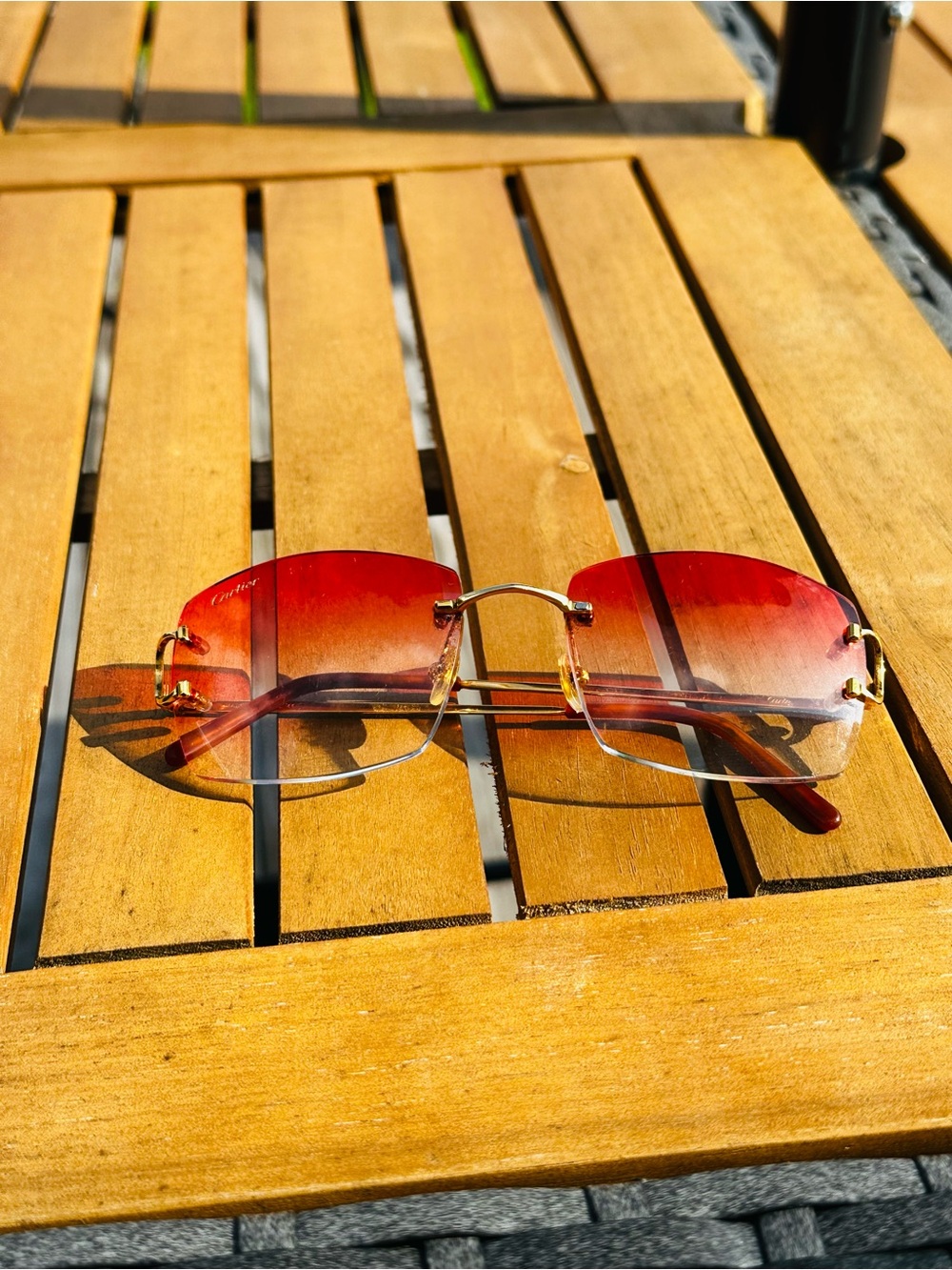 Cartier Rimless Sunglasses Red Gradient Lenses with Gold Bridge